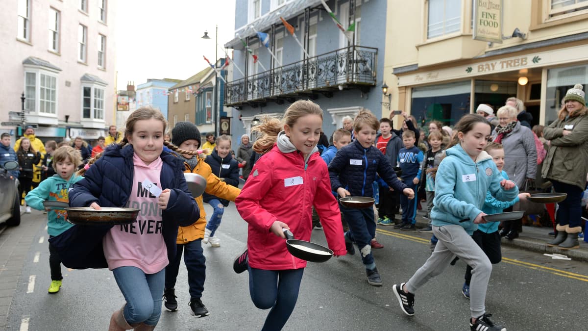Tenby’s popular pancake race in aid of RNLI back this week tenby